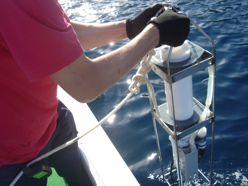 Deploying a CTD probe during Sea Grass in Corsica, 2013